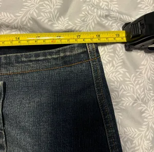 Urban Outfitters mini asymmetrical denim skirt with button closure thumbnail 7
