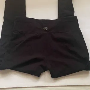 CK Calvin Klein zipper ankle black leggings, size medium thumbnail 1