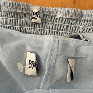Princess Polly Over Here satin blue with lace trim halter top and skort set thumbnail 6