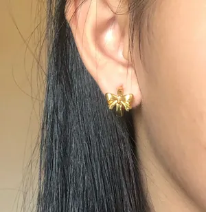 Gold Bow Hoops Earrings thumbnail 4