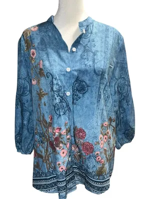 Blue faded look top with floral design. thumbnail 1