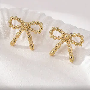 Chic Gold Bow Earrings thumbnail 3
