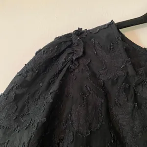 Free People Black Textured Sheer Flowy Blouse Open-Back Women's size Large thumbnail 4