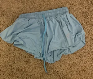 Blue athletic shorts thumbnail 1