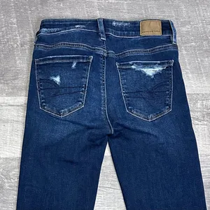 American Eagle AEO Dark Wash Jegging Jeans Womens 0 Reg High Rise Ripped Raw Hem thumbnail 5