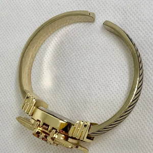 Vintage Gold Tone Enamel Poinsettia hidden face Cuff Style Watch 22mm running thumbnail 7