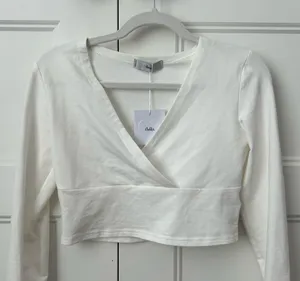 Adika Adults white crossover top with tags, size S thumbnail 1