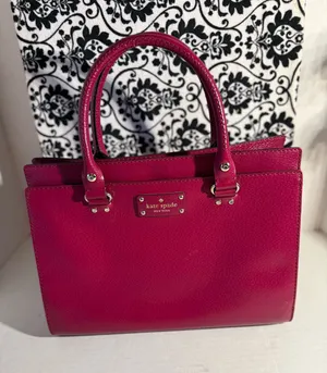 Kate Spade Wellesley Durham Small Pebbled Satchel in Burgundy thumbnail 1