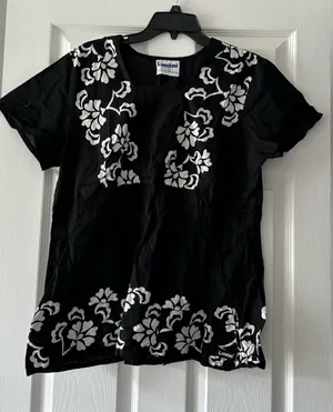 Landau short sleeve top is a size Medium. thumbnail 1