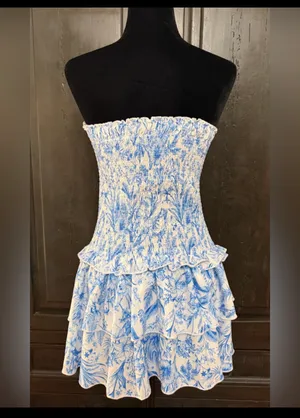 SHEIN Blue & White Floral Print Double Ruffle Hem Strapless Tube Dress -Size Med. Tiered Layer Ruffle Hem Tube Dress Sleeveless Tube Dress. Wear to a vacation, summer, spring outing, date night or party event. Super cute, gently warn & excellent condition. Measurements approximately 15” from armpit to armpit not fully stretched out from elastic x 25” long. Non-smoking home. Priced to sell at as is condition. Don’t like my price, make reasonable offer! thumbnail 2