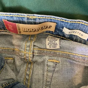 hand painted logo graphic jeans thumbnail 2