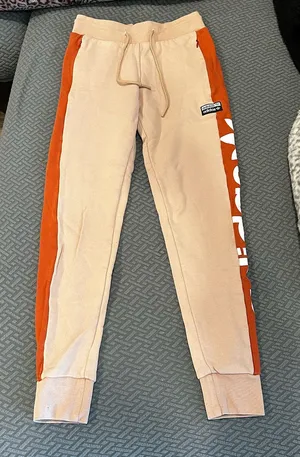 Adidas cream and orange joggers thumbnail 1