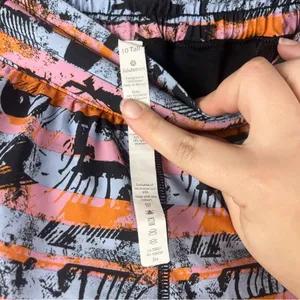 Lululemon Hotty Hot Multi Shorts size 10 tall Black Blue Orange print thumbnail 2