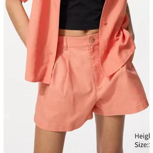 Uniqlo Linen Cotton 2.5" Inseam Shorts in Orange thumbnail 1