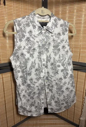 Banana Republic White Sleeveless Button-Down Shirt with Black Floral Print thumbnail 1