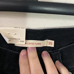Levi’s premium high loose flare jeans in black size 25 thumbnail 9