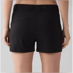 Lululemon On The Fly Woven Short Inseam 2.5" Black Size 12 thumbnail 2