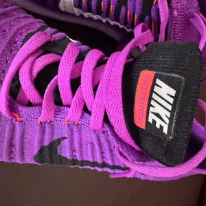 Nike Purple and Pink Flyknit Trainers thumbnail 2