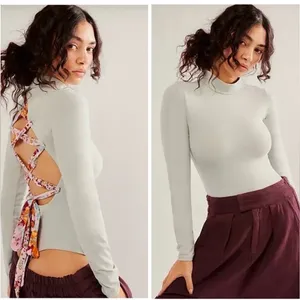 Free people Straps In The Back Bodysuit size medium thumbnail 2