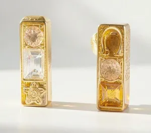 Coach Gold earrings with clear and pink gemstones thumbnail 1