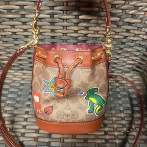 Coach Mini Bucket Bag In Signature Canvas With Sticker Print CW300 thumbnail 1