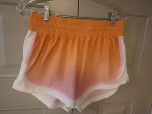 DSG ombre active shorts activewear in peach orange, white and pink size medium. thumbnail 1