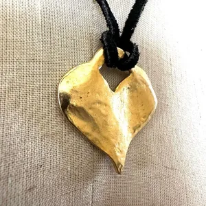 Gold tone heart pendant necklace on black cord thumbnail 4