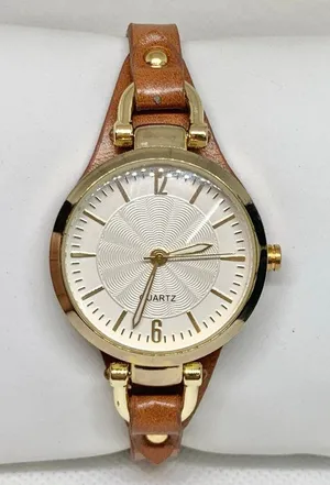 Women’s quartz analog watch gold tone 32mm round case brown leather band thumbnail 1