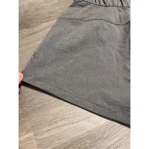 Lululemon On The Fly Mid Rise Shorts Gray Size 6 thumbnail 6