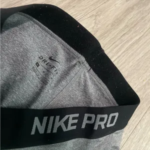 Nike Gray Athletic Leggings with Dark Gray Side Panels thumbnail 2