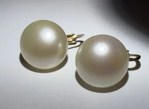 Vintage Signed 80s 90s‎ Ciner Faux Pearl Cabochon Gold Tone Clip-on Earrings thumbnail 1