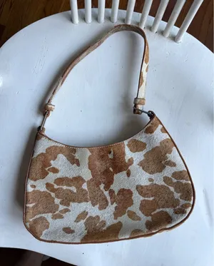 Urban Outfitters Brown and White Cow Print Shoulder Bag thumbnail 1