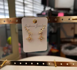 Gold painted earrings thumbnail 2