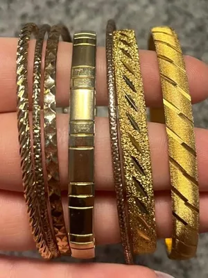 Set of six gold tone bangles thumbnail 1