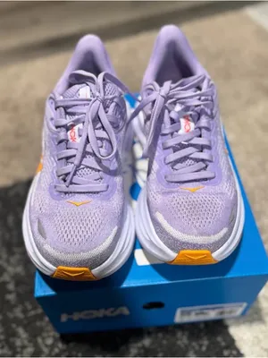 Hoka Women's Lavender Athletic Running Shoes with Orange Accents thumbnail 1