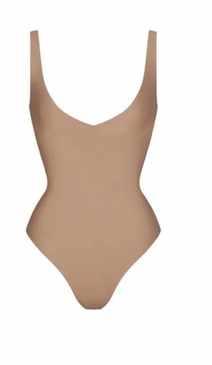 SKIMS Body Unlined Plunge Thong Bodysuit thumbnail 1