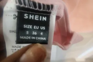 Shein sleeveless high neck low tie back mini short dress in light pink size small. thumbnail 11