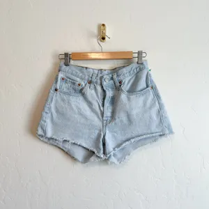 Levi's | 501 Original 100%‎ Cotton Cut Off Raw Hem Jean Shorts in Medium Blue thumbnail 2