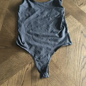 SKIMS Soft Smoothing Seamless Thong Bodysuit, Size XSmall, $68 thumbnail 12