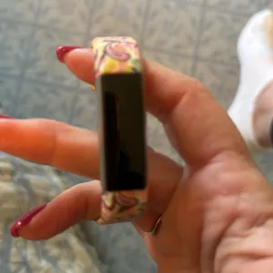 Fitbit barely used. As is. No idea what model. Cute band purchased separately thumbnail 5