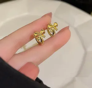 18k Gold Plated Bow Earrings thumbnail 1