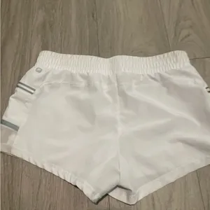 Fabletics White Women's Running Shorts with Reflective Trim thumbnail 2