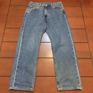 Levi’s 551 women’s medium wash jeans 27 thumbnail 1