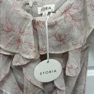 NWT Storia ruffle maxi dress featuring a floral print. Floral Ruffle Dress thumbnail 4