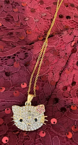 Hello Kitty Gold-tone Crystal Face Pendant with Pink Accents thumbnail 1