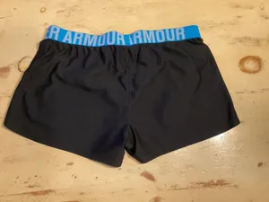 Under Armour Women's HeatGear Athletic Running Shorts with Logo Elastic Waistban thumbnail 3