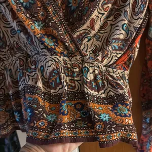 Free People Wrap Peplum Blouse in Brown and Orange Long Flared Sleeves thumbnail 3