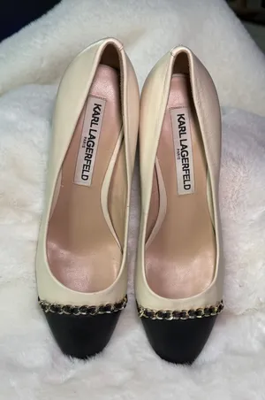 Karl Lagerfeld black + cream heels with gold chain detail thumbnail 1