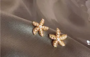 Gold Starfish Pearl Earrings thumbnail 1