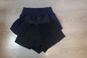 Bundle of XS's and smalls exercise workout shorts in black and navy blue. thumbnail 6